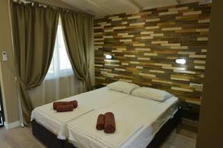 Гостевой дом Guesthouse Bamboo Сухум Большой двухместный номер с 1 кроватью или 2 отдельными кроватями-83